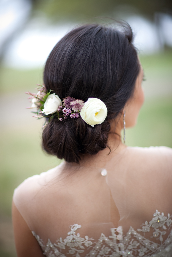 12_romantic-spring-ranch-wedding-gown-hair-updo-flowers