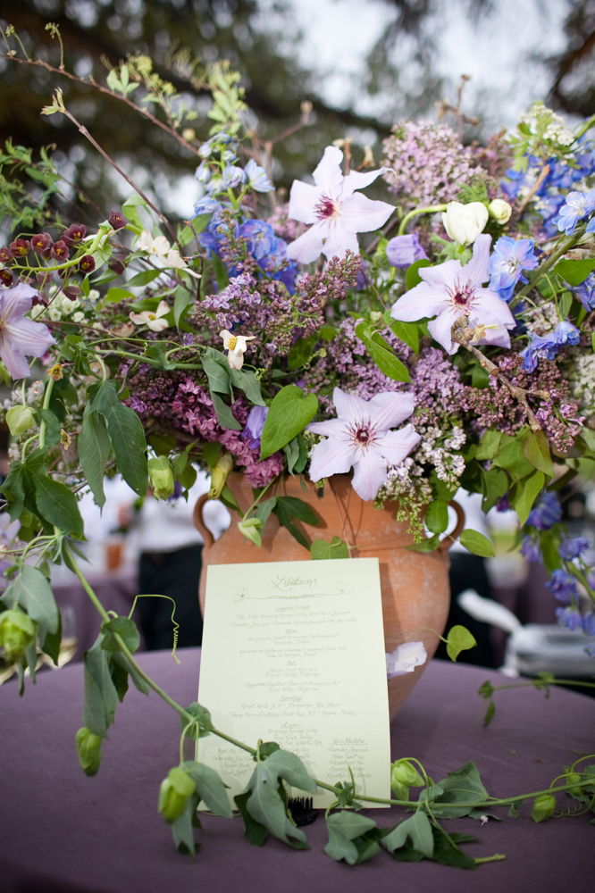 22_romantic-spring-ranch-wedding-cocktail-hour-bar-menu-floral-arrangement