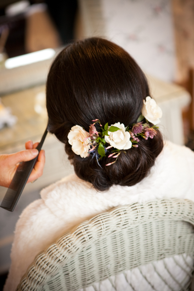 4_romantic-spring-ranch-wedding-hair-updo-flowers