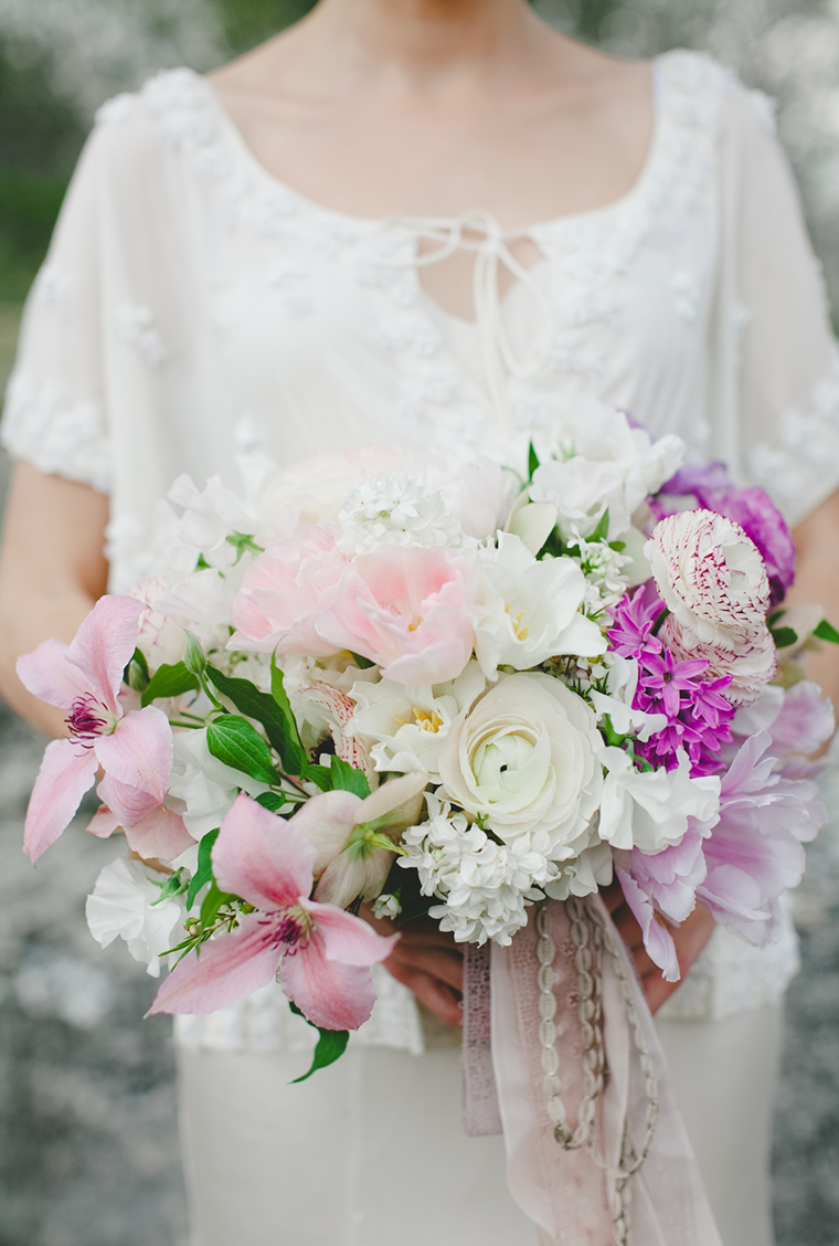 Spring Bridal Bouquet with Clematis, Ranunculus, and Lilac // by The Nouveau Romantics